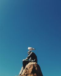 Low angle view of clear blue sky