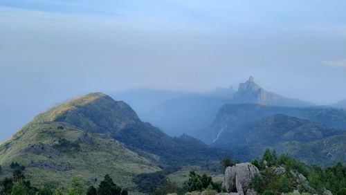 Beautiful scenic view from kodanad view point ooty of misty rain cloud hill mountain green forest