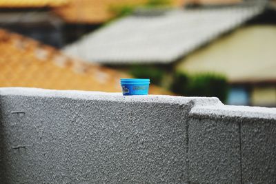 Close-up of retaining wall against building