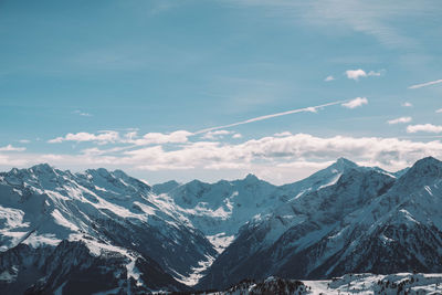 Scenic view of snowcapped mountains against sky