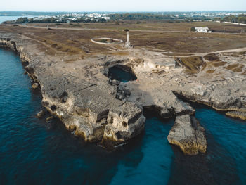 High angle view of rocks in sea