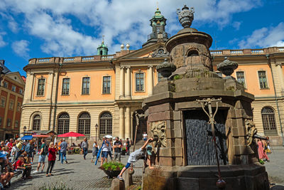 Group of people in front of building