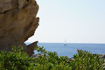 Scenic view of sea against clear sky