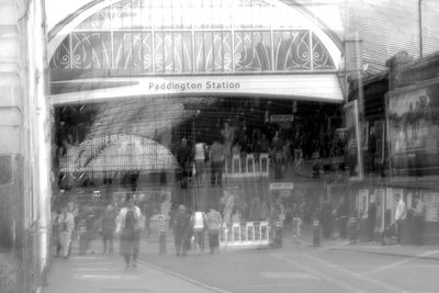 Reflection of people on mirror