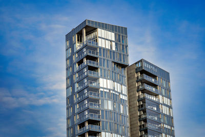 Low angle view of modern building against sky