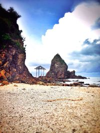 Scenic view of beach against sky