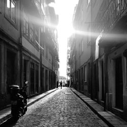 People walking on street in city