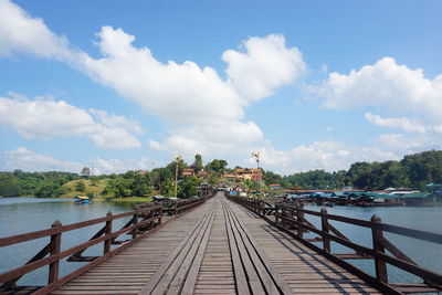 Bridge over river against sky