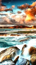 Scenic view of sea against sky during sunset