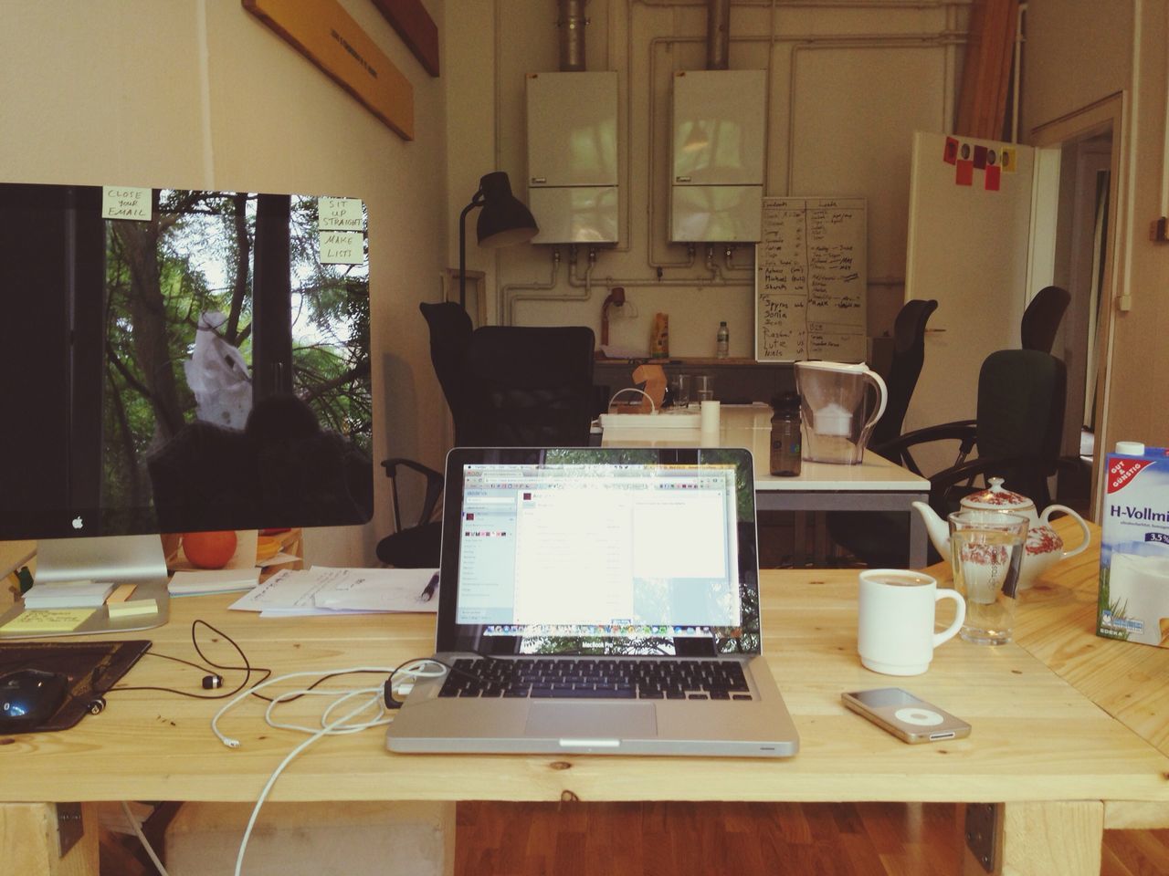 indoors, table, chair, home interior, book, window, absence, desk, living room, domestic room, office, domestic life, empty, restaurant, technology, picture frame, education, still life, communication, dining table