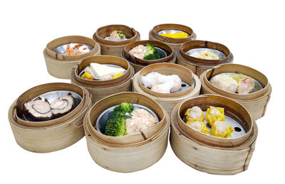 High angle view of spices against white background