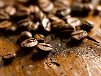 Close-up of coffee beans on table