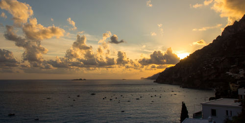 Scenic view of sea against sky at sunset