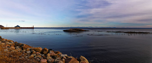 Scenic view of sea against sky during sunset