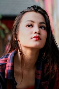 Close-up portrait of a beautiful young woman