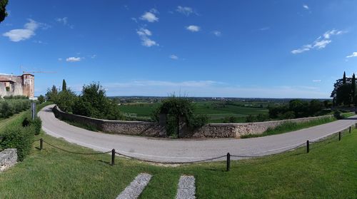 Panoramic shot of field against sky