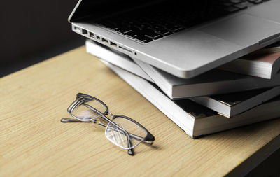 Close-up of eyeglasses on table