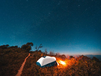 View of tent against star field at night