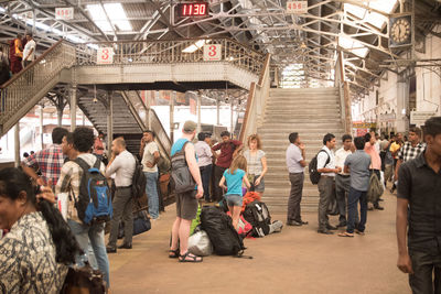 Passengers at railroad station platform