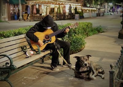 Side view of man with dog