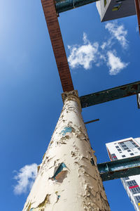 Low angle view of built structure against blue sky