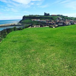 Scenic view of old town next to sea