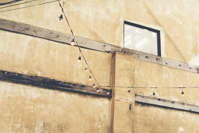 Low angle view of window of old building