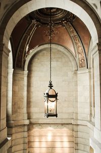 Old-fashioned illuminated lantern hanging at new york public library