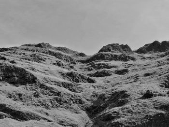 Scenic view of mountains against clear sky