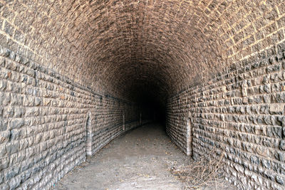 View of old wall in tunnel