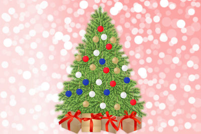 Close-up of illuminated christmas tree