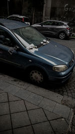 High angle view of cars parked on road