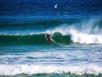 Man surfing in sea