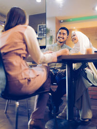 Young couple sitting on seat