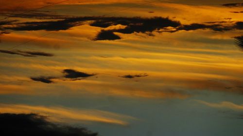 Low angle view of clouds in sky during sunset