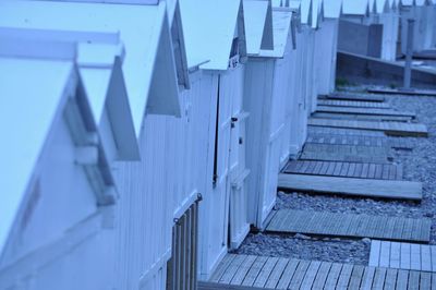 High angle view of beach huts in row at dusk