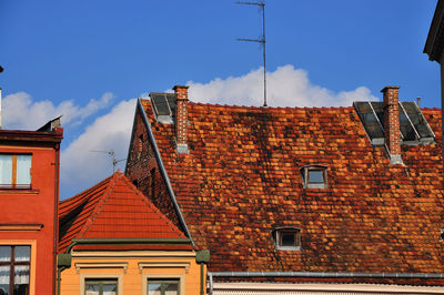 Low angle view of building against blue sky