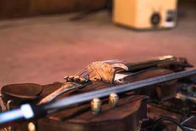 Close-up of violin on stage