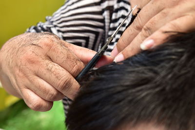 Close-up of hands working