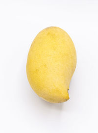 High angle view of apple against white background