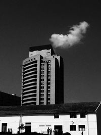 Low angle view of modern building against sky