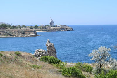Scenic view of sea against clear sky