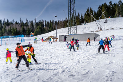 Group of people enjoying on snow