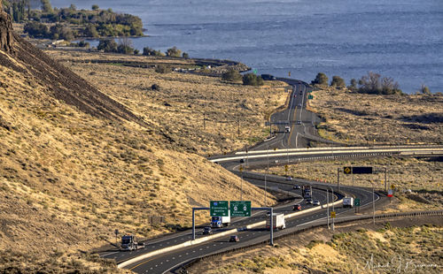 High angle view of highway and bridge in city