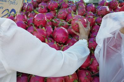 High angle view of people holding bouquet