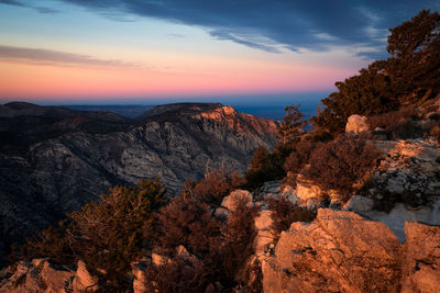 Scenic view of mountains against sky during sunset