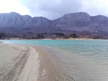 Scenic view of sea against mountains