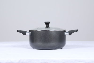 Close-up of teapot against white background