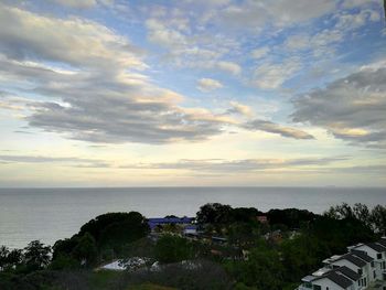 Scenic view of sea against cloudy sky