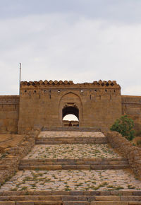 View of fort against cloudy sky